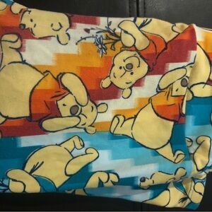 LuLaRoe Yellow, Teal, Orange Cartoon Print print- Winnie the poo